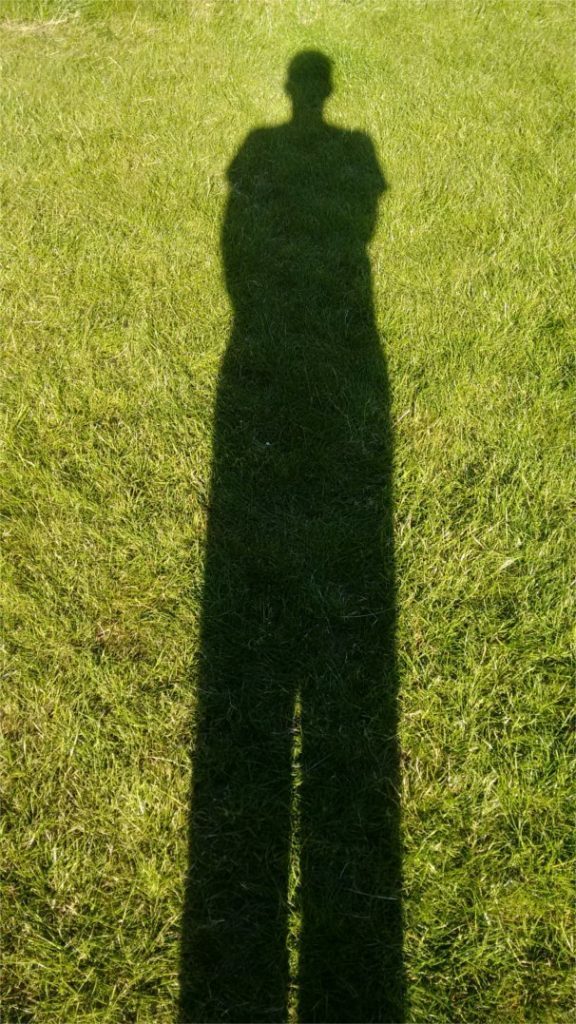 image of shadow for a man stood up