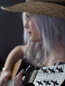 Anna Stacey model with guitar