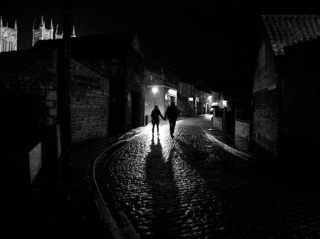 picture of couples shadows in street at night
