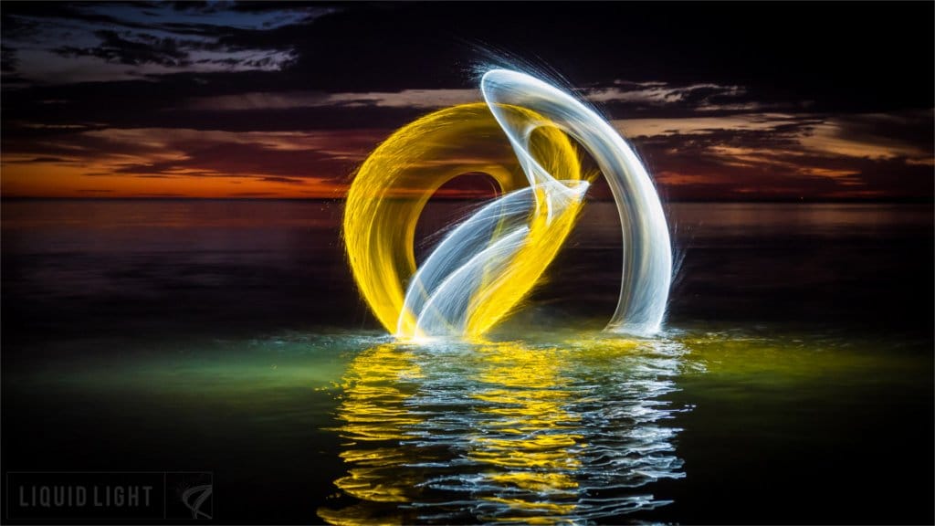 Interview a light painter  - orb in the sea