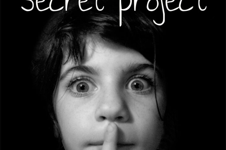 secret project cover of emily and finger over lips